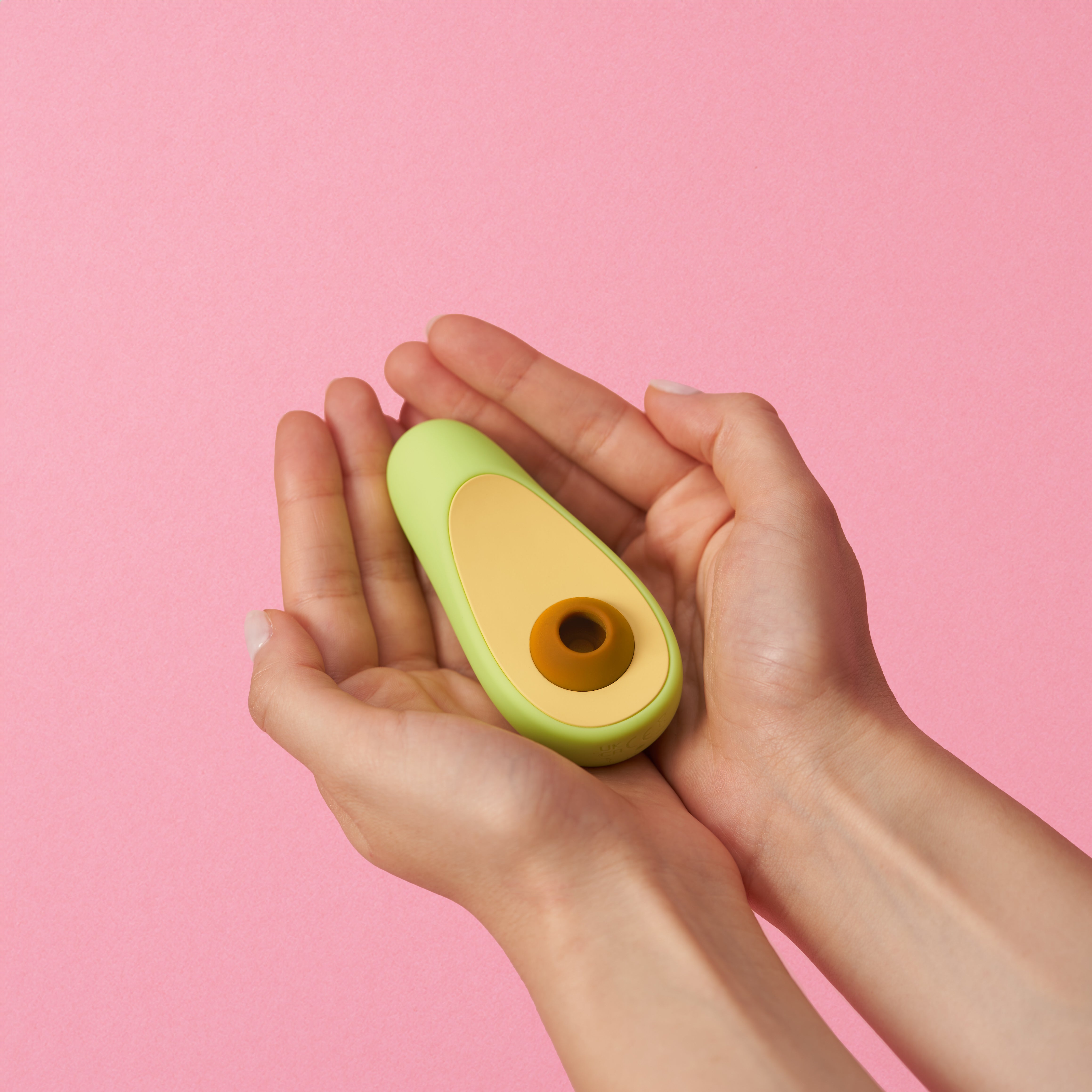Vibromasseur clitoridien Avocat — en main